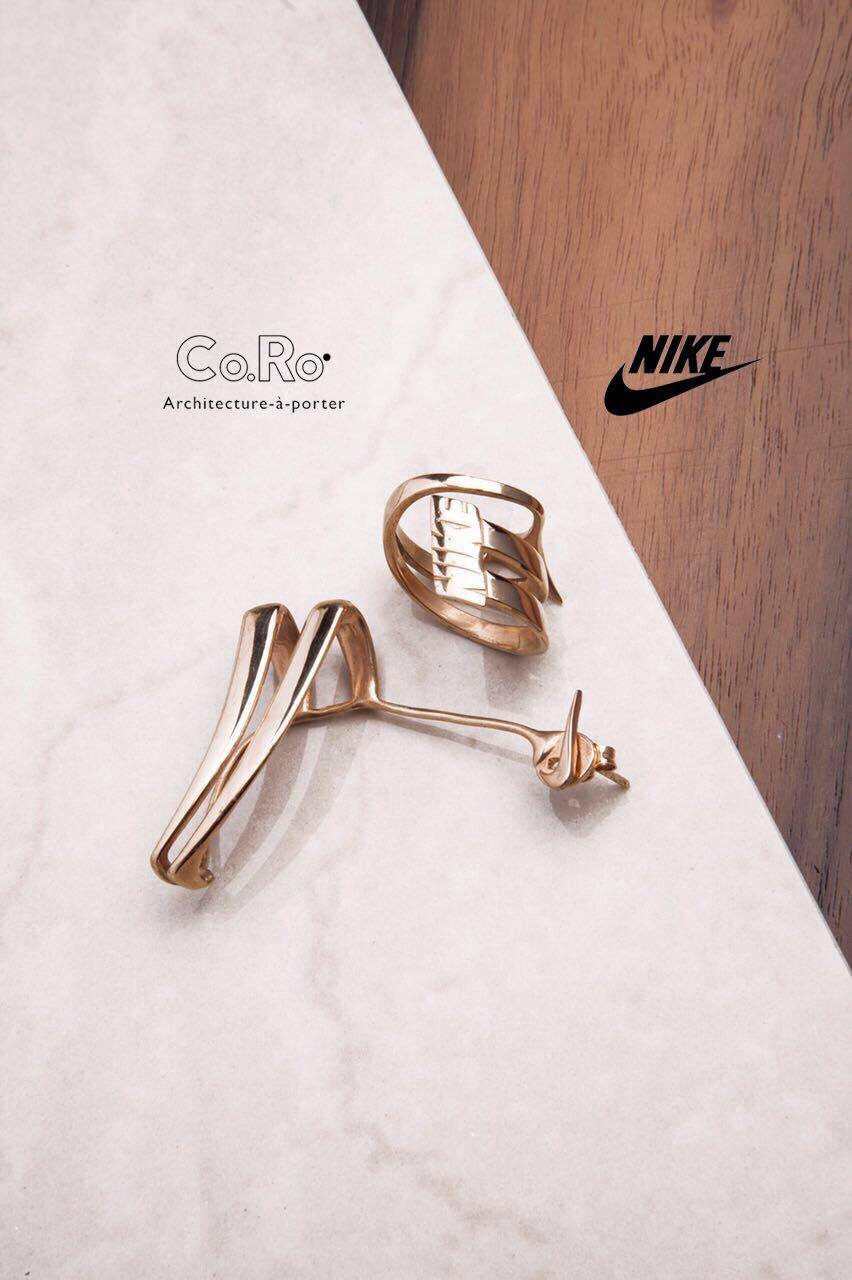Gold metal plated nike swoosh sale